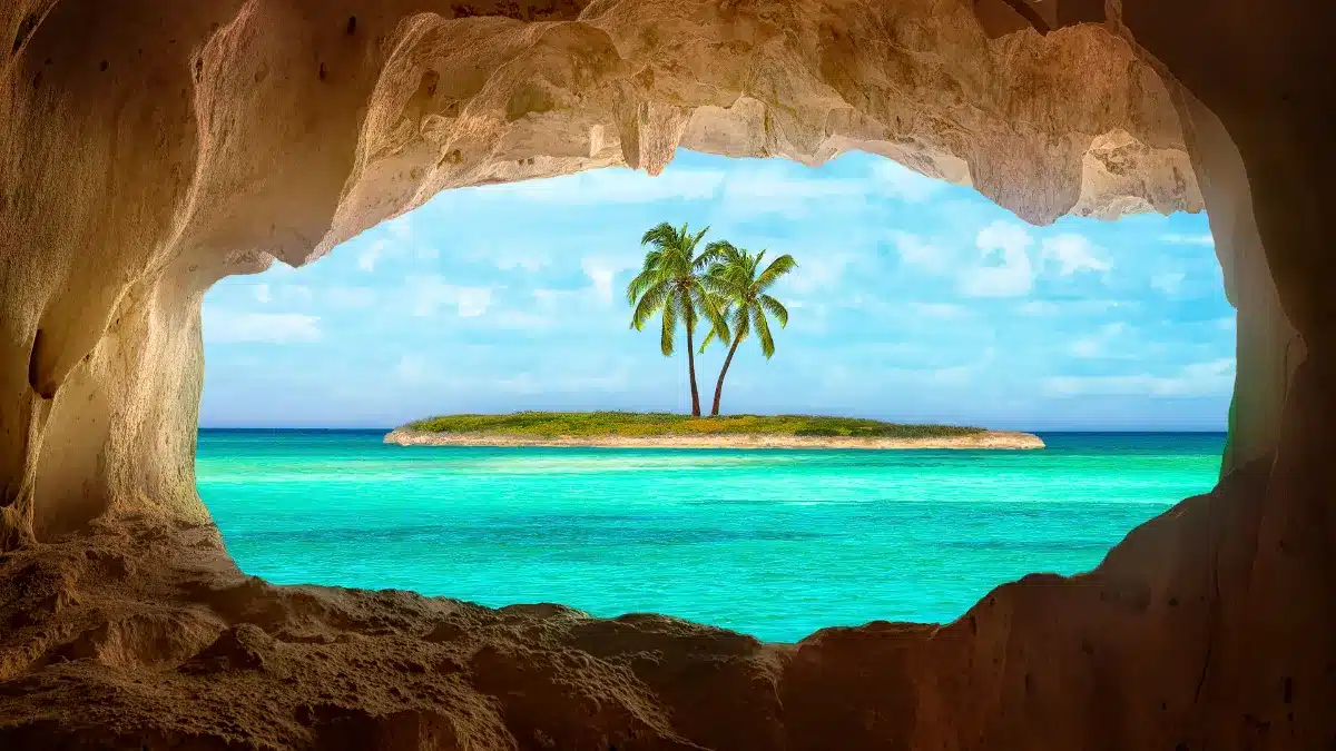 Tropical Beach scene through cave